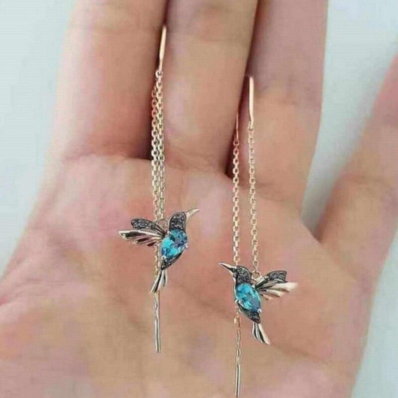 Earrings in the shape of a Hummingbird