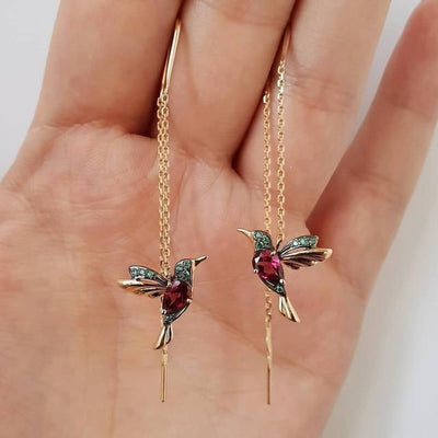 Earrings in the shape of a Hummingbird